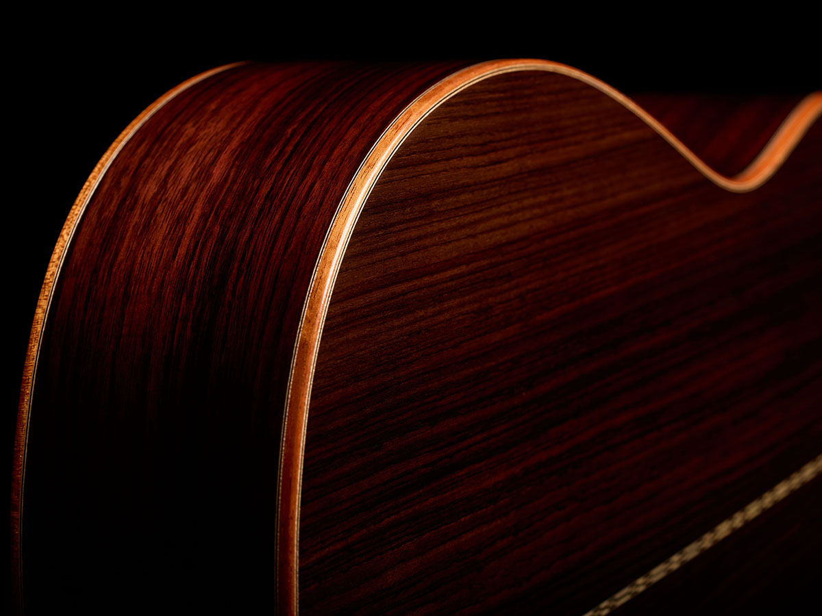 Close-up of Córdoba Stage Artist Traditional showcasing the solid cedar top and soundhole