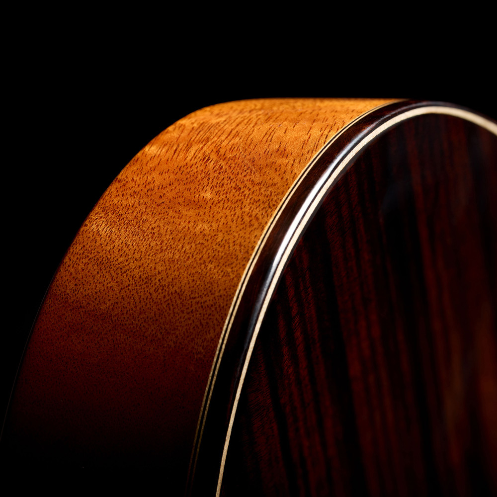 Close-up view of Stage Artist Habano Burst side curve thumb
