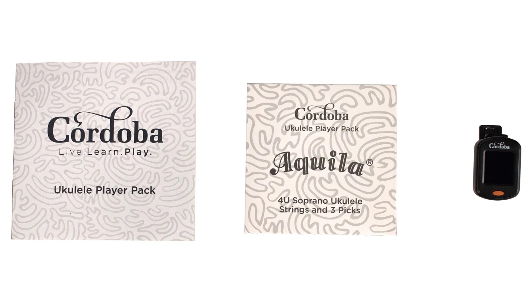 View of Ukulele Player Pack S booklet, Aquila strings, and clip-on tuner