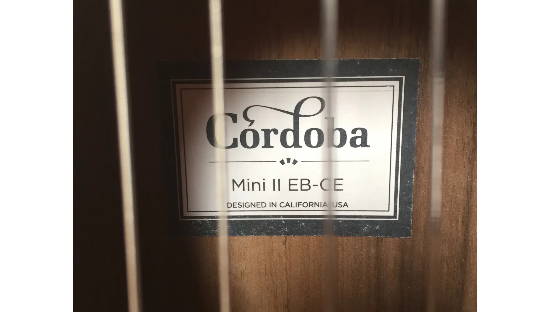 Inside view of the soundhole of Mini II EB-CE showing the Córdoba label